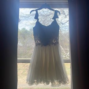 It’s been in my closet for 6 years I wore it once for a formal event.